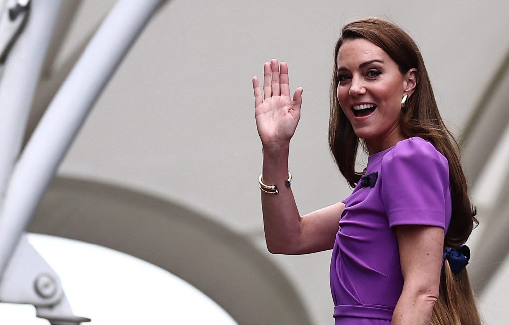 Britain's Catherine, Princess of Wales, waving upon arriving at the 2024 Wimbledon Championships in a purple dress