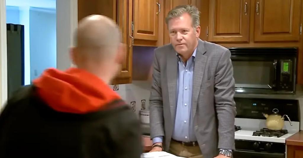 Chris Hansen from 'To Catch a Predator' standing in a kitchen