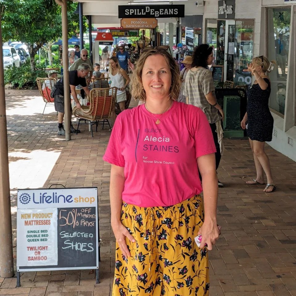 Alecia Staines standing in front of a store, who breastfed her friend's twins for a year due to the mother's low milk supply