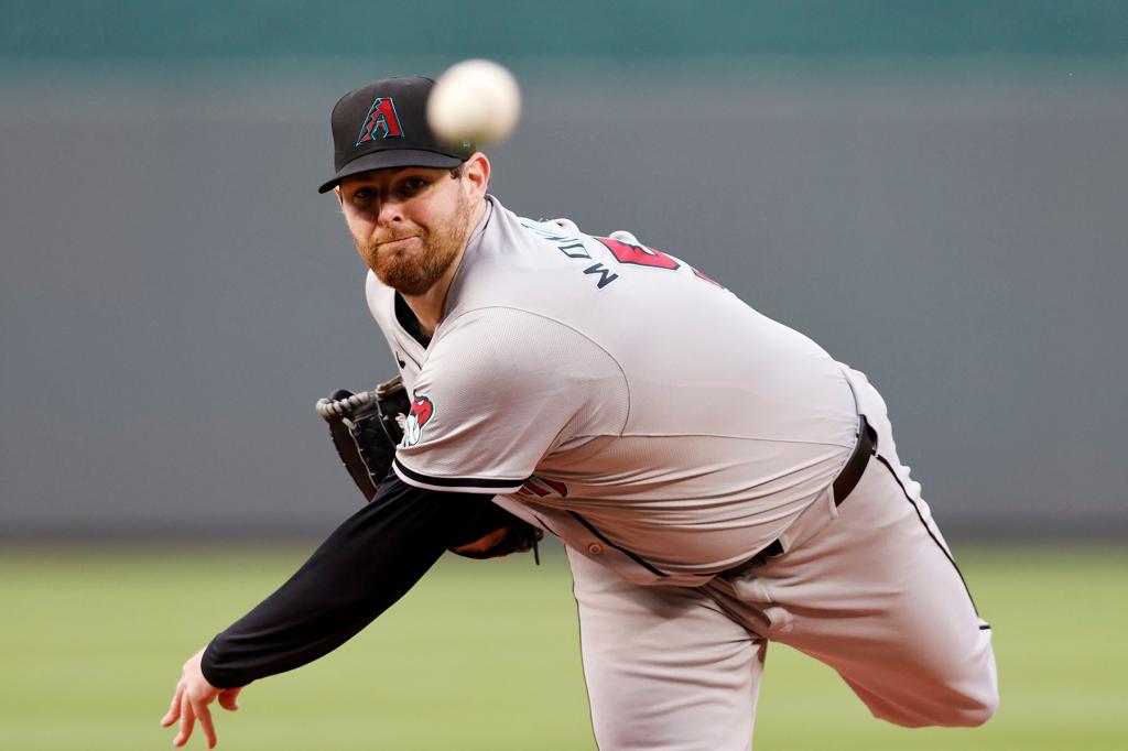 Arizona Diamondbacks pitcher Jordan Montgomery throws from the mound during the first inning of a baseball game against the Kansas City Royals in Kansas City, Mo., Tuesday, July 23, 2024. 