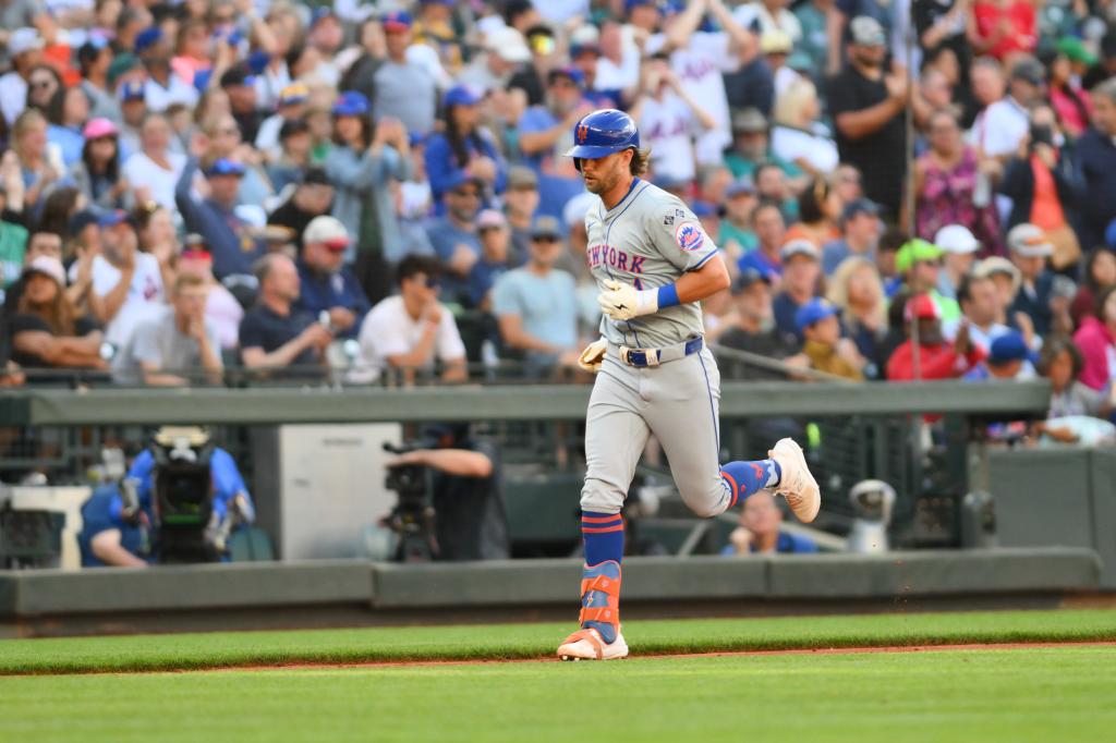 Mets right fielder Jeff McNeil (1) runs the bases after hitting a home run against the Seattle Mariners during the sixth inning at T-Mobile Park on Aug. 11, 2024.