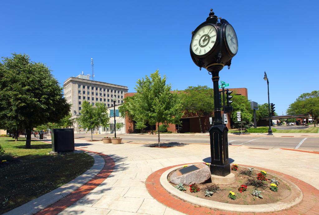 A clock on a pole in the city of Oshkosh, Wisconsin, where the Fox River enters Lake Winnebago.