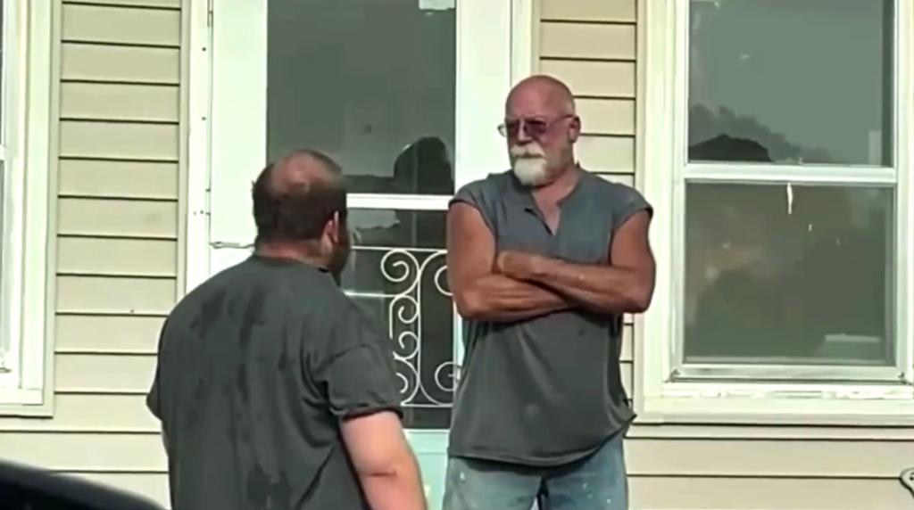 A photo of predator hunter Alex Rosen and Donald Letcher outside Letcher's house last month..