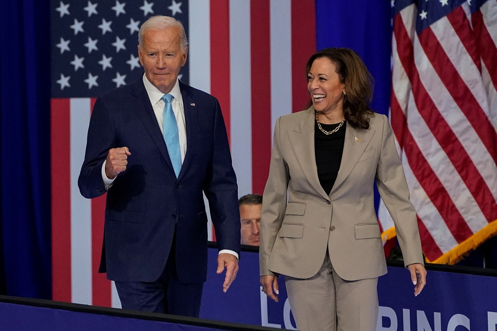 Biden walking out with Vice President Kamala Harris at the Medicare event.