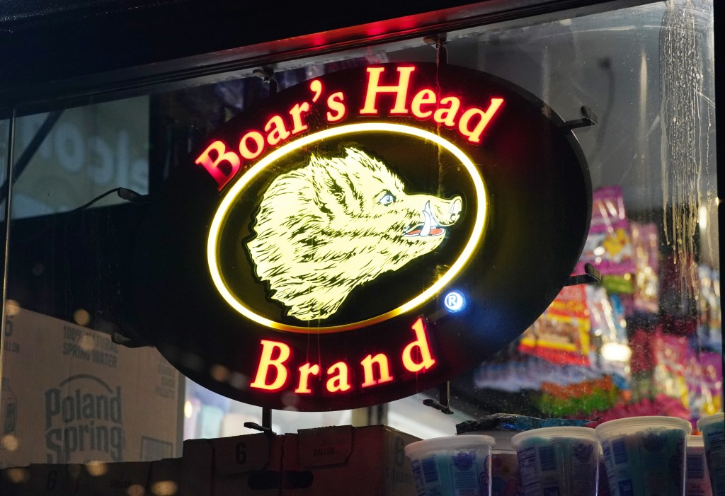 A photo of the Boar's Head logo.