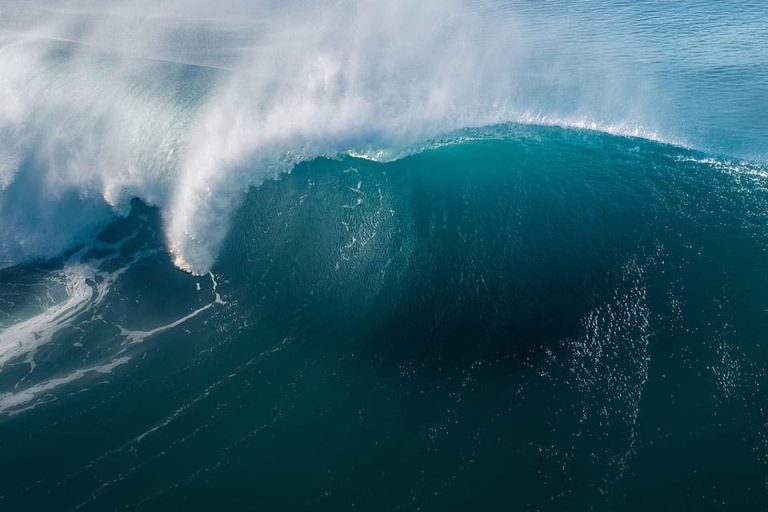 Breaking wave in sunlight. Credit: NOAA Ocean Service