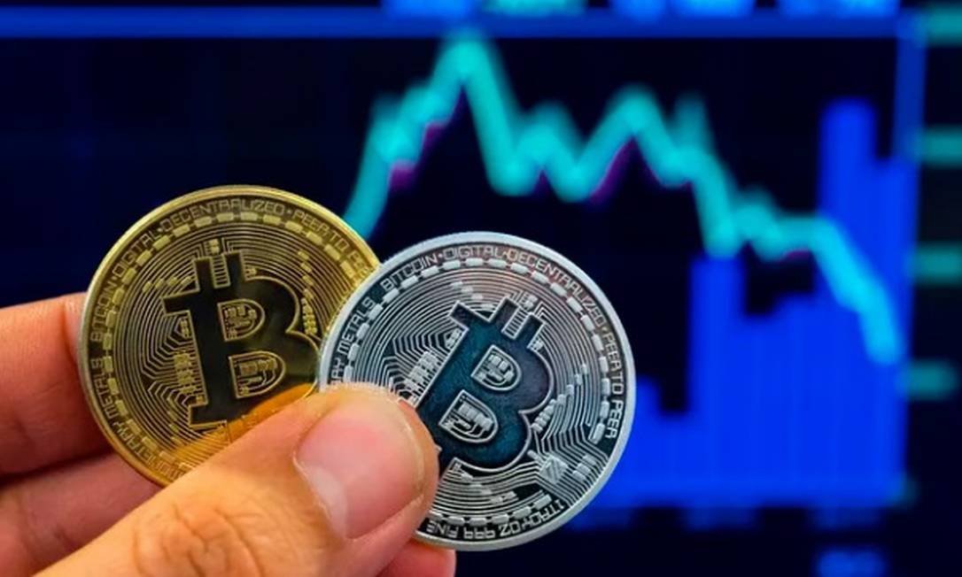 A mais popular das criptomoedas vive um momento de “vai ou racha” Foto: AFP