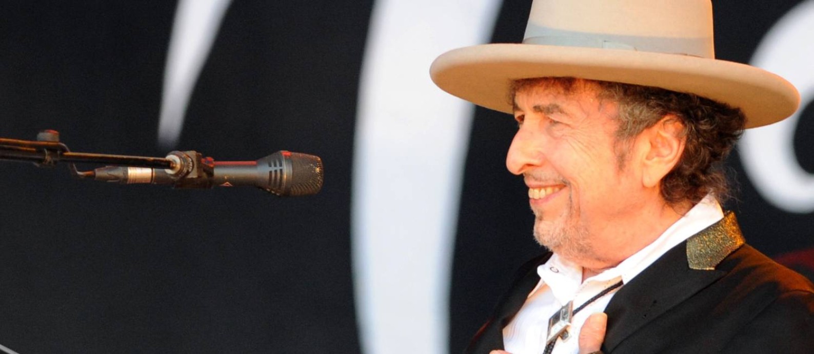O cantor e compositor Bob Dylan em show em 2012 Foto: FRED TANNEAU / AFP