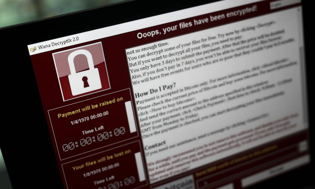 
Invadido. Tela de computador afetado pelo ciberataque mundial no ano passado
Foto: Simon Dawson /
Bloomberg/15-5-2017
