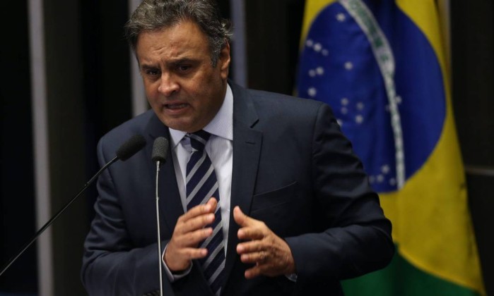 Aécio Neves em sessão do Impeachment de Dilma Foto: André Coelho / Agência O Globo