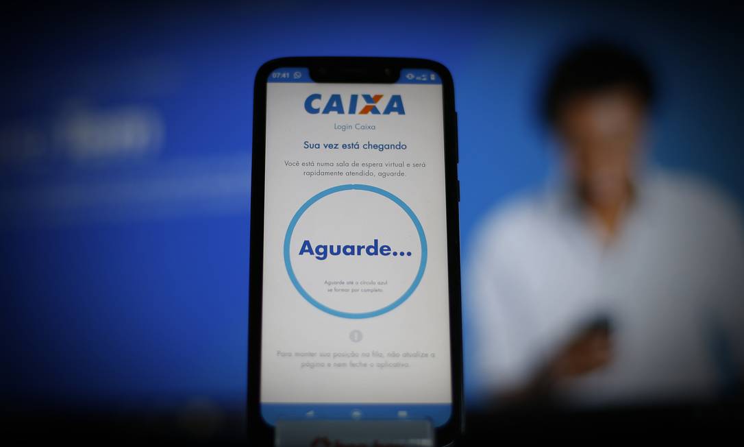 Aplicativo da Caixa Economica Federal pelo qual beneficiários têm acesso ao auxílio emergencial de R$ 600 Foto: Lucas Tavares/Zimel Press / Agência O Globo