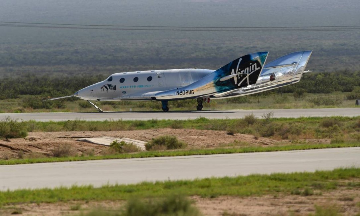 O avião espacial SpaceShipTwo retornou à Terra após a nave VSS Unity ser liberada no espaço Foto: PATRICK T. FALLON / AFP