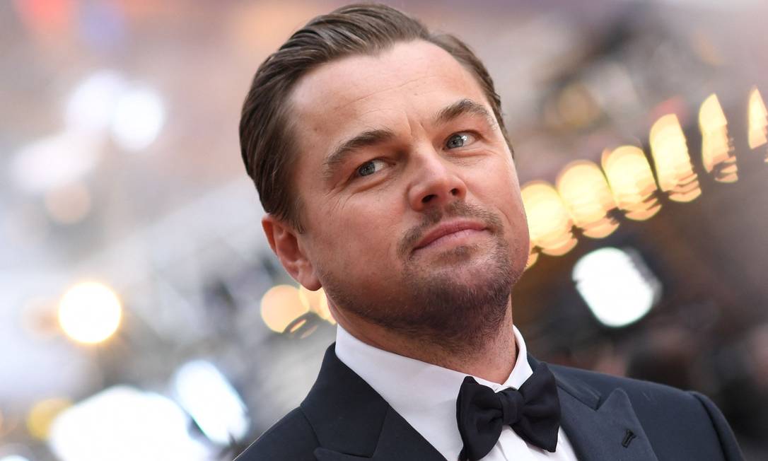 O ator Leonardo DiCaprio no tapete vermelho do Oscar, em 2020: engajado em causas ambientais Foto: VALERIE MACON / AFP