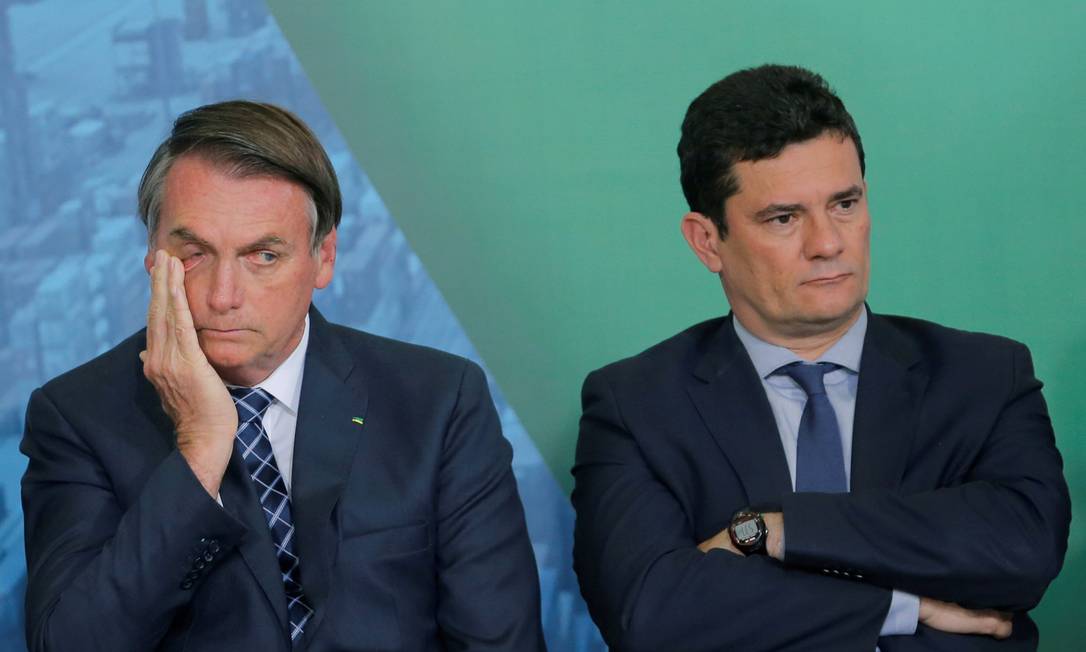 Bolsonaro e Moro durante cerimônia no Planalto, em 2019: ex-ministro tenta atrair governantes que apoiaram presidente Foto: ADRIANO MACHADO / Reuters/18-12-2019