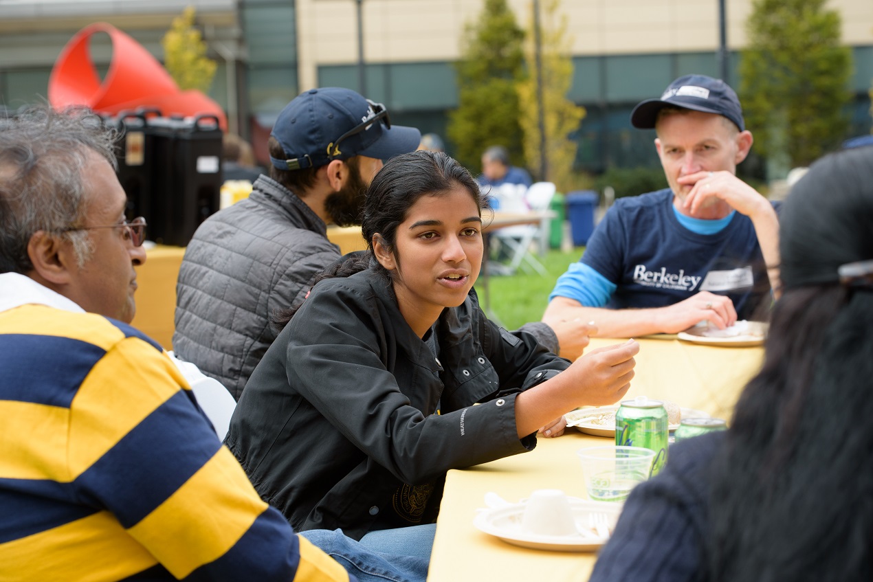 Students talking around a table