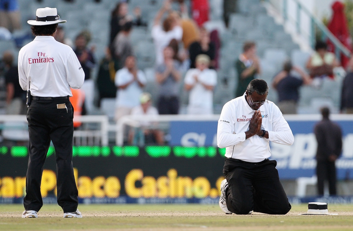 Bucknor gives thanks to the almighty during his last Test, in Cape Town in 2009