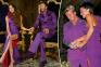 Victoria and David Beckham slip back into their iconic purple wedding outfits on their 25th anniversary