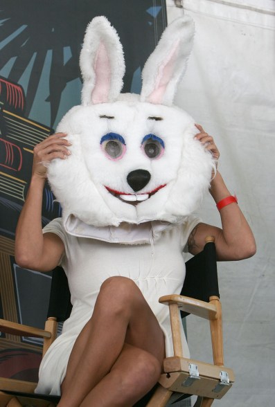 LOS ANGELES, CA - APRIL 28: Actress Pamela Anderson poses onstage with a large costume rabbit head after introducing PETA Chief Dan Mathews at the 12th Annual L.A. Times Festival of Books on the U.C.L.A. campus on April 28, 2007 in Los Angeles, California. Mr. Mathews, who was dressed in a bunny costume, subsequently read from his recently published "Committed: A Rabble Rouser's Memoir." (Photo by Charley Gallay/Getty Images) *** Local Caption *** Pamela Anderson