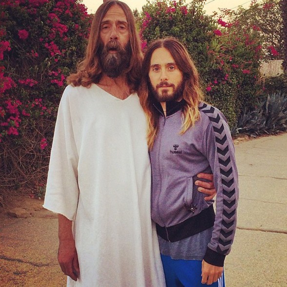 It's the second coming and a guy who looks like Jesus. We won't tell you who's who, but one of them is Jared Leto.