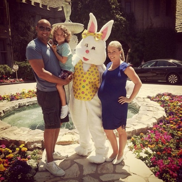 Hank Baskett, Hank Baskett , Jr., and the Easter bunny bond with former Playboy bunny Kendra Wilkinson.