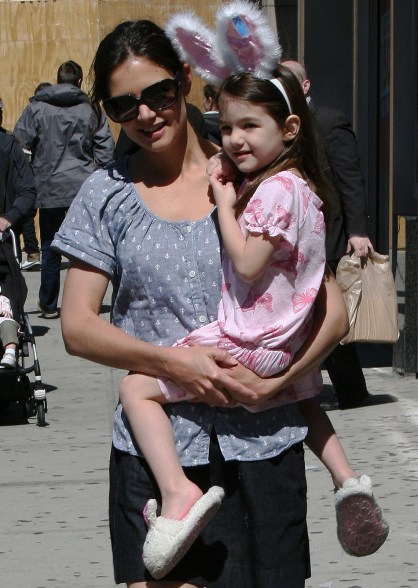 Suri Cruise seen wearing bunny ears and slippers while out and about with mom Katie Holmes in New York City. Pictured: Suri Cruise and Katie Holmes Ref: SPL171380 100410 Picture by: Splash News Splash News and Pictures Los Angeles: 310-821-2666 New York: 212-619-2666 London: 870-934-2666 photodesk@splashnews.com