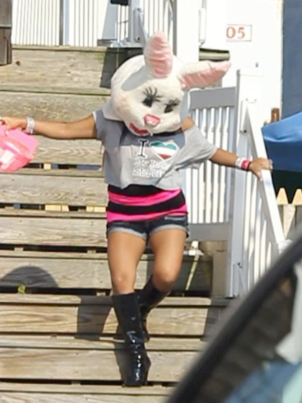 Snooki has a bunny head on her body as she leaves Jersey Shore house on her final day at the famous home that she filmed three seasons of the hit show 'Jersey Shore' with her fellow castmates. Snooki was picked up by her dad and then forgot to get her bunny hat. She raced upstairs to pick it up and then wobbled down the stairs to her BMW. She then got in the car and had to drive by the fans in a packed car full of her clothes and held the bunny head out the window as they cheered for her. Pictured: Snooki Ref: SPL302797 010811 Picture by: Brian Prahl / Splash News Splash News and Pictures Los Angeles: 310-821-2666 New York: 212-619-2666 London: 870-934-2666 photodesk@splashnews.com