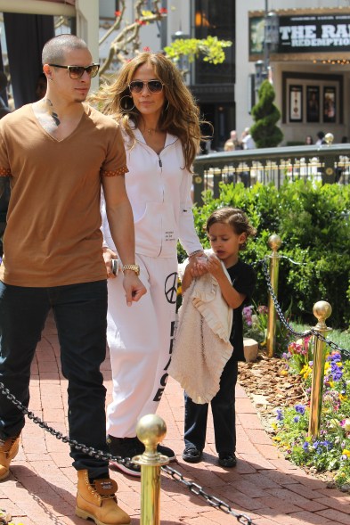 Jennifer Lopez and boyfriend Casper Smart seen taking her son to pose with the Easter Bunny at the Grove in Los Angeles. Pictured: Jennifer Lopez, Casper Smart and Max Anthony Ref: SPL379024 050412 Picture by: Splash News Splash News and Pictures Los Angeles: 310-821-2666 New York: 212-619-2666 London: 870-934-2666 photodesk@splashnews.com