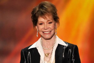 Mary Tyler Moore accepts the Life Achievement Award at the Screen Actors Guild Awards in 2012.