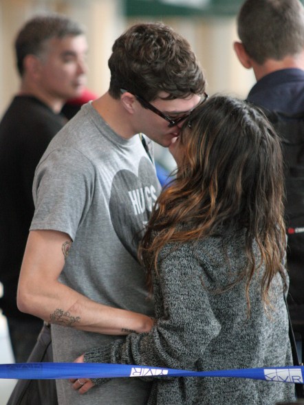 "90210" star Shenae Grimes and her boyfriend Josh Beech show some serious PDA at the airport! Sporting jean shorts and a Lil' Wayne t-shirt, she made her way out of Vancouver, making jokes and talking to the people in line. She even posed with a little b! Pictured: Shenae Grimes and Josh Beech Ref: SPL406726 130712 Picture by: R Chiang / Splash News Splash News and Pictures Los Angeles: 310-821-2666 New York: 212-619-2666 London: 870-934-2666 photodesk@splashnews.com