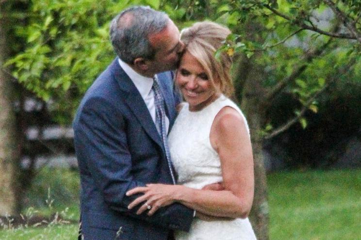 Katie Couric poses with friends and family as she marries John Molner in an intimate East Hampton ceremony in New York.