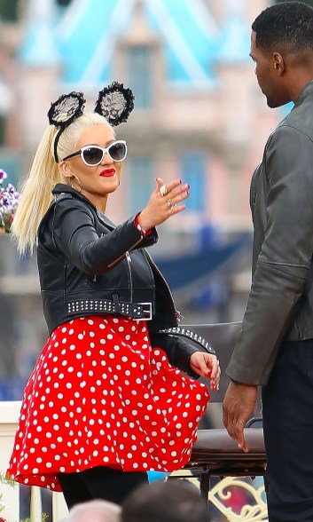 Christina Aguilera channels her inner Minnie Mouse in Disneyland on Sunday.