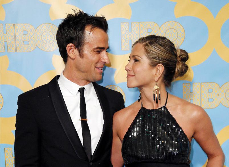 Theroux and Aniston make eyes at one another at the HBO Golden Globes afterparty on Jan. 11.