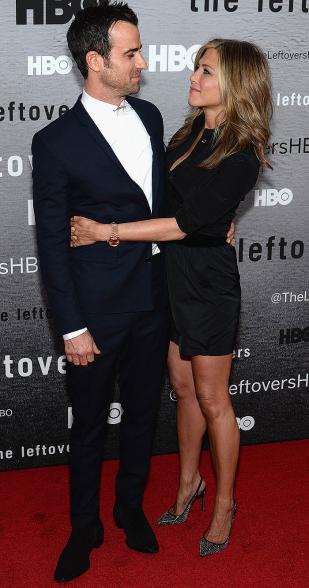 Aniston hugs Theroux at the premiere of "The Leftovers" on June 23, 2014.