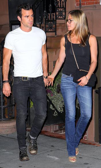 Theroux and Aniston leave dinner in New York on July 21, 2013.