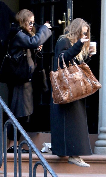 Mary-Kate and Ashley Olsen step out in the East Village on Wednesday.