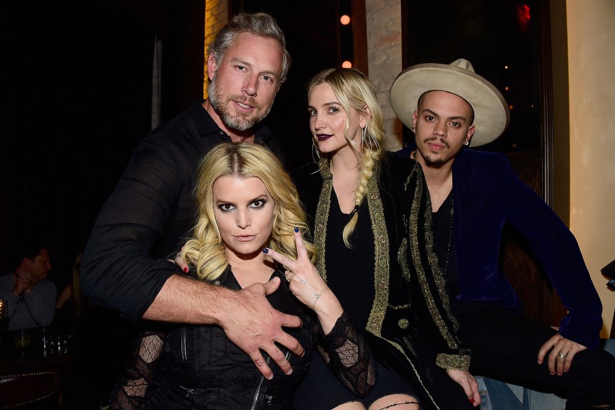 It's a family affair: Jessica Simpson, Eric Johnson, Ashlee Simpson and Evan Ross attend Linda Perry's "Hands of Love" party in Los Angeles on Tuesday.