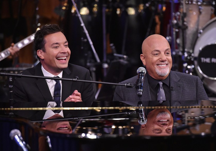 Billy Joel performs with Jimmy Fallon on "The Tonight Show" in New York on Wednesday.