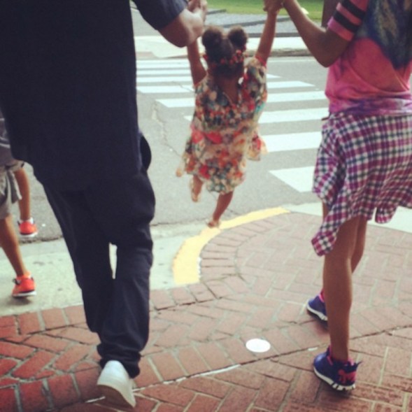 Walking with mom and dad on July 21, 2014