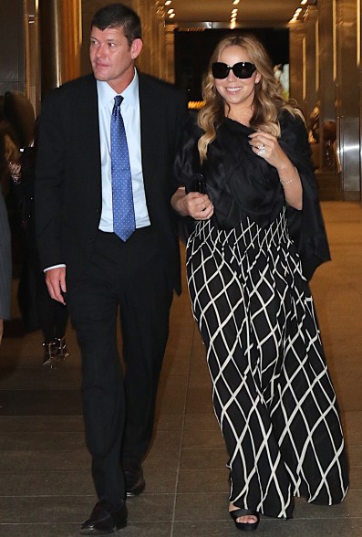 Packer and Carey leave a dinner date on Sept. 24, 2015.