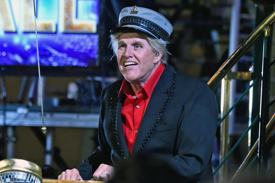 Gary Busey told FOX411, "I know him personally. I know him professionally. He's a great guy. He's sharp. He's fast. He can change the country after the last eight years."