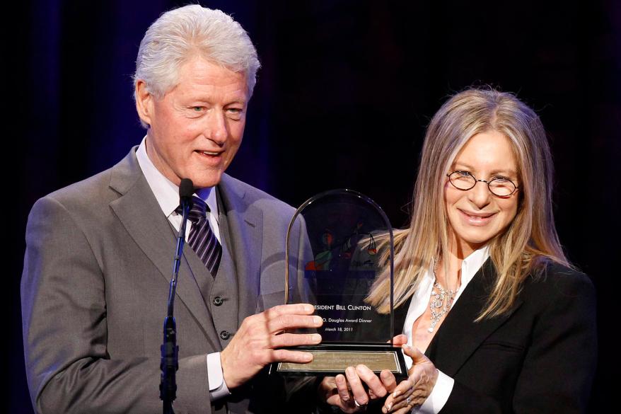 Barbra Streisand, seen here with Bill Clinton in 2011, >endorses the former Secretary of State.