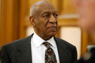 FILE - In this May 24, 2016 file photo, Bill Cosby departs the Montgomery County Courthouse after a preliminary hearing, in Norristown, Pa. Hugh Hefners attorneys are asking a judge to dismiss the Playboy founder from a lawsuit filed by a woman who accuses Bill Cosby of abusing her at the Playboy Mansion in 2008. A motion filed Tuesday, June 28, in a Los Angeles federal court contends that a lawsuit filed by former model Chloe Goins is barred by the statute of limitations, and she has not pleaded facts that would allow the case to proceed. (AP Photo/Matt Rourke, Pool)