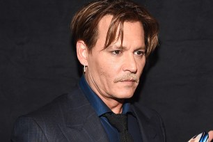 LOS ANGELES, CA - JANUARY 18: Actor Johnny Depp, winner of the Favorite Movie Icon award, poses backstage at the People's Choice Awards 2017 at Microsoft Theater on January 18, 2017 in Los Angeles, California. (Photo by Emma McIntyre/Getty Images for People's Choice Awards)