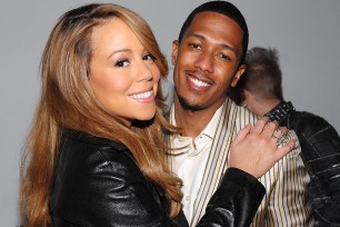 NEW YORK - DECEMBER 08: *Exclusive Coverage* Singer Mariah Carey (L) and actor Nick Cannon attend the launch of VEVO, the world's premiere destination for premium music video and entertainment at Skylight Studio on December 8, 2009 in New York City. (Photo by Dimitrios Kambouris/Getty Images for VEVO)
