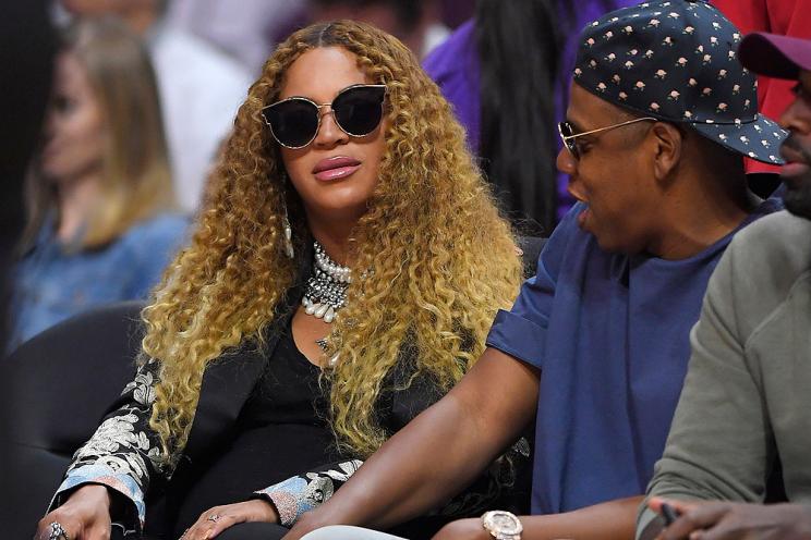 Beyonce and Jay Z watch during the first half in Game 7 of an NBA basketball first-round playoff series between the Los Angeles Clippers and the Utah Jazz, Sunday, April 30, 2017, in Los Angeles. (AP Photo/Mark J. Terrill)