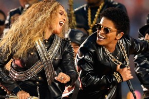 SANTA CLARA, CA - FEBRUARY 07: Beyonce and Bruno Mars perform during the Pepsi Super Bowl 50 Halftime Show at Levi's Stadium on February 7, 2016 in Santa Clara, California. (Photo by Ezra Shaw/Getty Images)