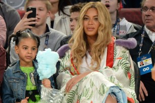 NEW ORLEANS, LA - FEBRUARY 19: Blue Ivy Carter and Beyonce Knowles attend the 66th NBA All-Star Game at Smoothie King Center on February 19, 2017 in New Orleans, Louisiana. (Photo by Kevin Mazur/Getty Images)