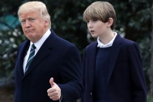 WASHINGTON, DC - MARCH 17: U.S. President Donald Trump and his son Barron Trump depart the White House March 17, 2017 in Washington, DC. The first family is scheduled to spend the weekend at their Mar-a-Lago Club in Palm Beach, Florida. (Photo by Chip Somodevilla/Getty Images)