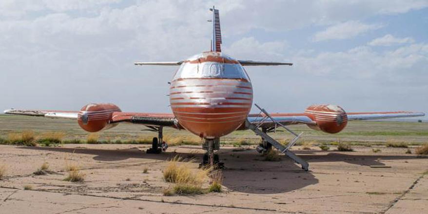 The 1962 red Lockheed JetStarOne, which has been referred to as the 'lost' jet, is expected to fetch over $3.5 million when it is sold at auction on May 27. The aircraft, which is still in its original condition, was one of three jets owned by the legendary singer throughout his life time. This particlauy jet was said to be extra special to Elvis as he owned it with his father Vernon Presley. The jet, which is being listed by GWS Auctions, is currently owned by a private collector who has not been named. The interior was custom designed to Elvis' specifications with gold-tone finishings, woodwork, red velvet seats and a red shag carpet. It also comes with a TV, microwave and a toilet. The jet is one of only 204 aircraft manufactured between 1957 and 1978 in a private project between Jetstar and Lockheed. This aircraft has never been restored and features original external painting and detailing, as well as original interior. The jet is the only airplane once belonging to Elvis that is still owned privately, as the only other two in existence are owned by The Elvis Presley Museum. Pictured: Jet owned by Elvis Presley Ref: SPL1503176 190517 Picture by: Splash News / GWS Auctions Splash News and Pictures Los Angeles: 310-821-2666 New York: 212-619-2666 London: 870-934-2666 photodesk@splashnews.com