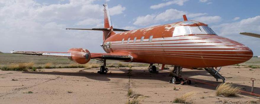 The 1962 red Lockheed JetStarOne, which has been referred to as the 'lost' jet, is expected to fetch over $3.5 million when it is sold at auction on May 27. The aircraft, which is still in its original condition, was one of three jets owned by the legendary singer throughout his life time. This particlauy jet was said to be extra special to Elvis as he owned it with his father Vernon Presley. The jet, which is being listed by GWS Auctions, is currently owned by a private collector who has not been named. The interior was custom designed to Elvis' specifications with gold-tone finishings, woodwork, red velvet seats and a red shag carpet. It also comes with a TV, microwave and a toilet. The jet is one of only 204 aircraft manufactured between 1957 and 1978 in a private project between Jetstar and Lockheed. This aircraft has never been restored and features original external painting and detailing, as well as original interior. The jet is the only airplane once belonging to Elvis that is still owned privately, as the only other two in existence are owned by The Elvis Presley Museum. Pictured: Jet owned by Elvis Presley Ref: SPL1503176 190517 Picture by: Splash News / GWS Auctions Splash News and Pictures Los Angeles: 310-821-2666 New York: 212-619-2666 London: 870-934-2666 photodesk@splashnews.com